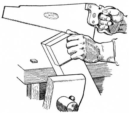 Fig. 70.Sawing the Cheek of a Halving Joint.