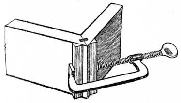 Fig. 116.Cramping a Tongued and Grooved Mitre.